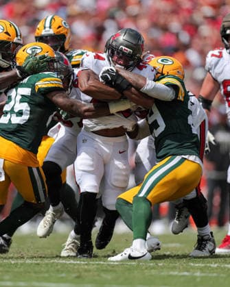 Oct 4, 2026; Tampa, FL, USA; Tampa Bay Buccaneers running back Sean Tucker (44) fights for a first down on a 4th & 1 during the NFL, American Football Herren, USA game between the Green Bay Packers and Tampa Bay Buccaneers at Raymond James Stadium. Mandatory Credit: Taylor McFee-Cal Media Tampa USA - ZUMAc04_ 20261004_zma_c04_069 Copyright: xTaylorxMcfeex