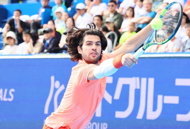 October 4, 2026, Tokyo, Japan - Carlos Alcaraz of Spain returns the ball against Denis Shapovalov of Canada during the quarter-final match of the Japan Open tennis championships at the Ariake Colosseum in Tokyo on Sunday, October 4, 2026. Shapovalov gave up the game in the middle and alcaraz advanced to the semi-final 7-6, 6-1. (photo by Yoshio Tsunoda AFLO) Noxthirdxpartyxsales 0868518543st YoshioxTsunodax