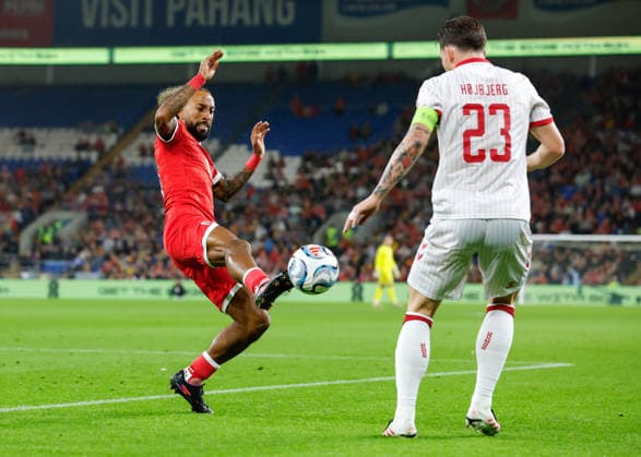 Cardiff, Wales, 4th October 2026. Sorba Thomas of Wales controls the ball during the Wales vs Denmark UEFA Nations League match at the Cardiff City Stadium, Cardiff. Picture credit should read: Cody Froggatt Sportimage EDITORIAL USE ONLY. No use with unauthorised audio, video, data, fixture lists, club league logos or live services. Online in-match use limited to 120 images, no video emulation. No use in betting, games or single club league player publications. SPI_017_CF_WALES_V_DENMARK SPI-5051-0017