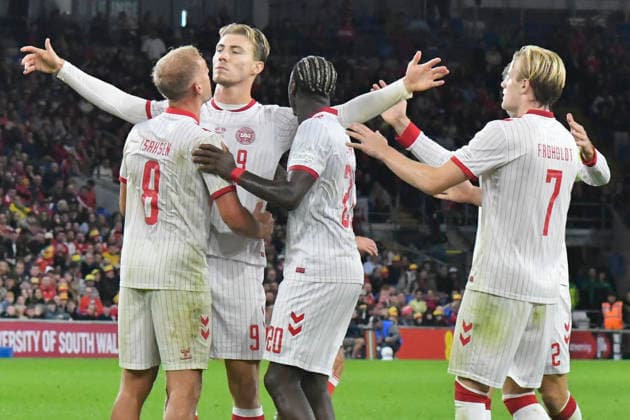 Football - 2026 2027 UEFA Nations League - League A, Group Four: Wales vs. Denmark - Cardiff City Stadium - Sunday 4th October 2026 Rasmus Hojlund DENMARK celebrates scoring his team s first goal, with Mohamed Daramy DENMARK, Gustav Isaksen DENMARK & Victor Froholdt DENMARK colorsport winston bynorth 