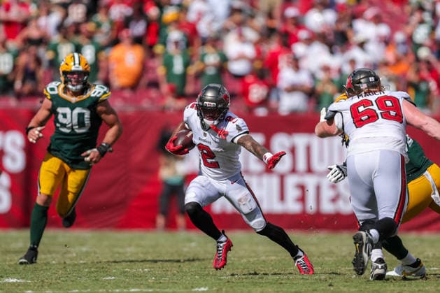 Oct 4, 2026; Tampa, FL, USA; Tampa Bay Buccaneers wide receiver Emeka Egbuka (2) attempt to avoid a tackle after catching a pass from quarterback Jalon Daniels (10) during the NFL, American Football Herren, USA game between the Green Bay Packers and Tampa Bay Buccaneers at Raymond James Stadium. Mandatory Credit: Taylor McFee-Cal Media NFL 2026: Packers Vs Buccaneers OCT 04  - ZUMAc04_ 20261004_zma_c04_104 Copyright: xTaylorxMcfeex