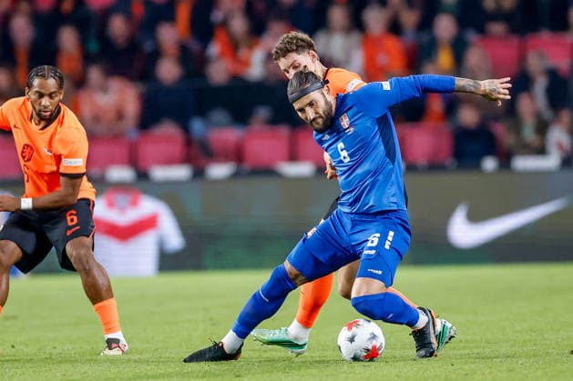 EINDHOVEN, NETHERLANDS - OCTOBER 4: Nemanja Gudelj of Serbia is challenged by Ruben van Bommel of Netherlands during the UEFA Nations League 2026 27 Group A2 MD4 match between Netherlands and Serbia at Philips Stadion on October 04, 2026 in Eindhoven, Netherlands.  Copyright: xDijksxMedia MBxMediax