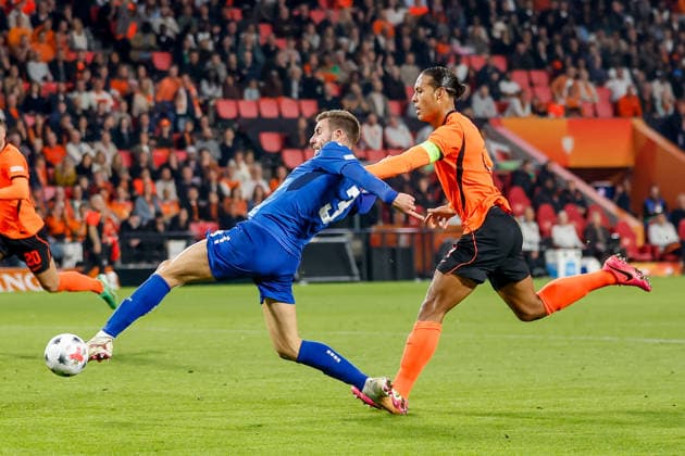 EINDHOVEN, NETHERLANDS - OCTOBER 4: Strahinja Pavlovic of Serbia is challenged by Virgil van Dijk of Netherlands during the UEFA Nations League 2026 27 Group A2 MD4 match between Netherlands and Serbia at Philips Stadion on October 04, 2026 in Eindhoven, Netherlands.  Copyright: xDijksxMedia MBxMediax