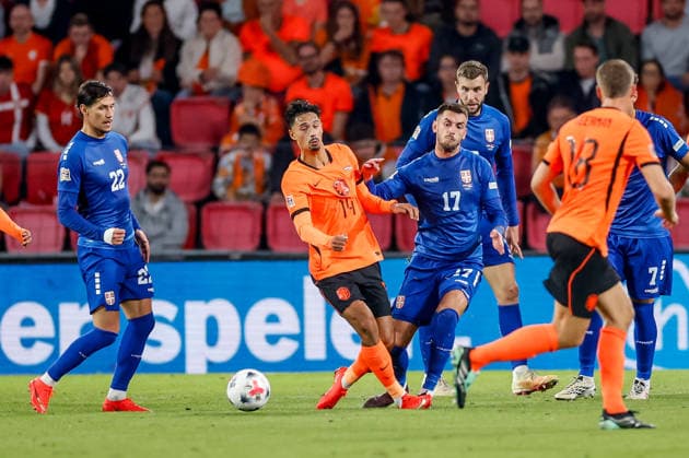 EINDHOVEN, NETHERLANDS - OCTOBER 4: Aleksa Terzic of Serbia battles for the ball with Tijjani Reijnders of Netherlands during the UEFA Nations League 2026 27 Group A2 MD4 match between Netherlands and Serbia at Philips Stadion on October 04, 2026 in Eindhoven, Netherlands.  Copyright: xDijksxMedia MBxMediax