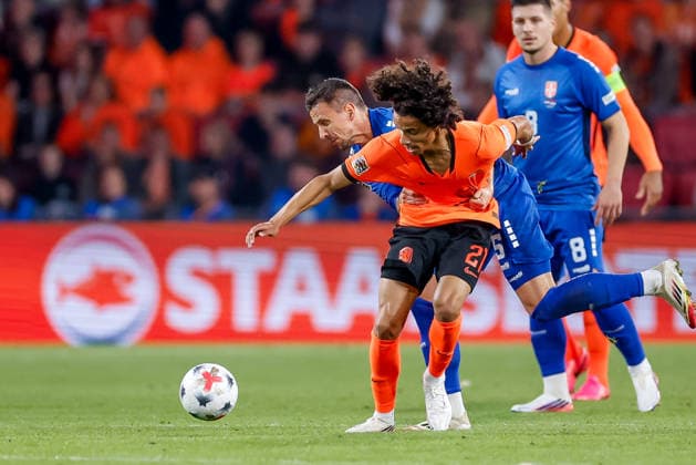 EINDHOVEN, NETHERLANDS - OCTOBER 4: Gjivai Zechiel of Netherlands battles for the ball with Nemanja Maksimovic of Serbia during the UEFA Nations League 2026 27 Group A2 MD4 match between Netherlands and Serbia at Philips Stadion on October 04, 2026 in Eindhoven, Netherlands.  Copyright: xDijksxMedia MBxMediax