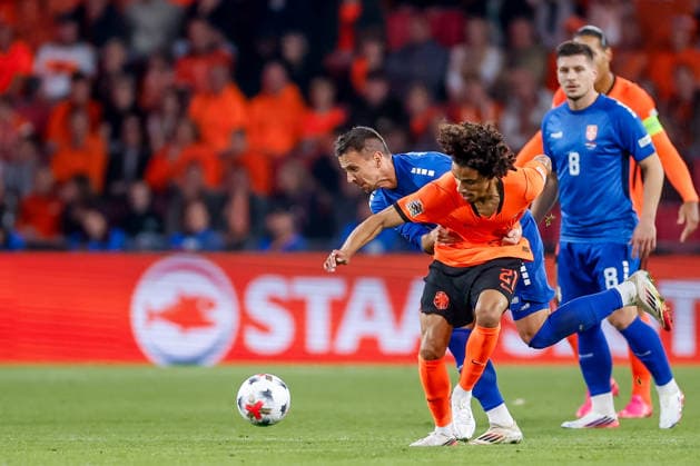 EINDHOVEN, NETHERLANDS - OCTOBER 4: Gjivai Zechiel of Netherlands battles for the ball with Nemanja Maksimovic of Serbia during the UEFA Nations League 2026 27 Group A2 MD4 match between Netherlands and Serbia at Philips Stadion on October 04, 2026 in Eindhoven, Netherlands.  Copyright: xDijksxMedia MBxMediax