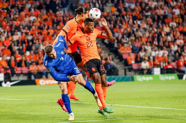 EINDHOVEN, NETHERLANDS - OCTOBER 4: Strahinja Pavlovic of Serbia battles for the ball with Virgil van Dijk of Netherlands and Denzel Dumfries of Netherlands during the UEFA Nations League 2026 27 Group A2 MD4 match between Netherlands and Serbia at Philips Stadion on October 04, 2026 in Eindhoven, Netherlands.  Copyright: xDijksxMedia MBxMediax