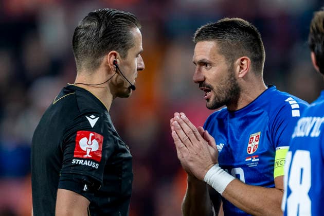 EINDHOVEN l Referee Donatas Rumöas and Serbian forward Dusan Tadic during the UEFA Nations League match between the Netherlands and Serbia at Philips Stadion on October 4, 2026, in Eindhoven, the Netherlands. Photo by DeFodi Images