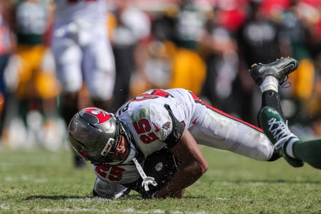 Oct 4, 2026; Tampa, FL, USA; Tampa Bay Buccaneers cornerback Jacob Parrish (25) intercepts a pass from Green Bay Packers quarterback Jordan Love (10) during the NFL, American Football Herren, USA game between the Green Bay Packers and Tampa Bay Buccaneers at Raymond James Stadium. Mandatory Credit: Taylor McFee-Cal Media Tampa USA - ZUMAc04_ 20261004_zma_c04_106 Copyright: xTaylorxMcfeex