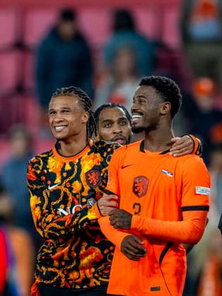 EINDHOVEN l Dutch defender Nathan Ake and Dutch defender Jorrel Hato during the UEFA Nations League match between the Netherlands and Serbia at Philips Stadion on October 4, 2026, in Eindhoven, the Netherlands. Photo by DeFodi Images