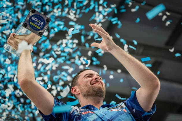 RECORD DATE NOT STATED 4th October 2026; Mattioli Arena, Leicester, England; PDC World Grand Prix Darts, World Grand Prix, Final Day; Luke Humphries celebrates winning the final against Gerwyn Price and holds the Boyle Sports World Grand Prix trophy as the confetti falls GodfreyxPitt