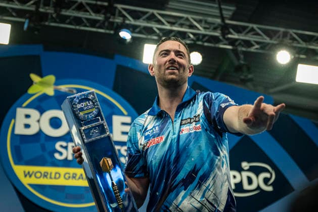 RECORD DATE NOT STATED 4th October 2026; Mattioli Arena, Leicester, England; PDC World Grand Prix Darts, World Grand Prix, Final Day; Luke Humphries celebrates winning the final against Gerwyn Price and holds the Boyle Sports World Grand Prix trophy GodfreyxPitt