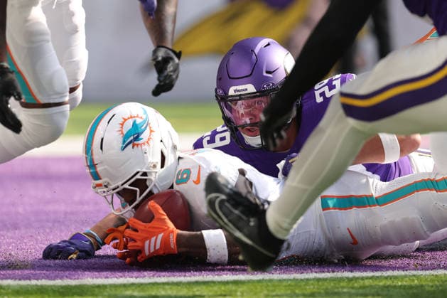 MINNEAPOLIS, MN - OCTOBER 04: Miami Dolphins wide receiver Malik Washington (6) recovers a punt while Minnesota Vikings safety Jacob Thomas (29) tackles him during the first half of the NFL, American Football Herren, USA game between the Miami Dolphins and the Minnesota Vikings on October 4th, 2026, at U.S. Bank Stadium in Minneapolis, MN. (Photo by Bailey Hillesheim Icon Sportswire) NFL: OCT 04 Dolphins at Vikings EDITORIAL USE ONLY Icon20261004008