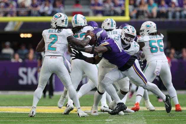 MINNEAPOLIS, MN - OCTOBER 04: Minnesota Vikings linebacker Dallas Turner (15) forces a fumble from Miami Dolphins quarterback Malik Willis (2) during the first half of the NFL, American Football Herren, USA game between the Miami Dolphins and the Minnesota Vikings on October 4th, 2026, at U.S. Bank Stadium in Minneapolis, MN. (Photo by Bailey Hillesheim Icon Sportswire) NFL: OCT 04 Dolphins at Vikings EDITORIAL USE ONLY Icon20261004029