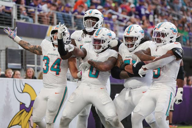 MINNEAPOLIS, MN - OCTOBER 04: Miami Dolphins running back Ollie Gordon II (0) celebrates scoring a touchdown during the second half of the NFL, American Football Herren, USA game between the Miami Dolphins and the Minnesota Vikings on October 4th, 2026, at U.S. Bank Stadium in Minneapolis, MN. (Photo by Bailey Hillesheim Icon Sportswire) NFL: OCT 04 Dolphins at Vikings EDITORIAL USE ONLY Icon20261004041