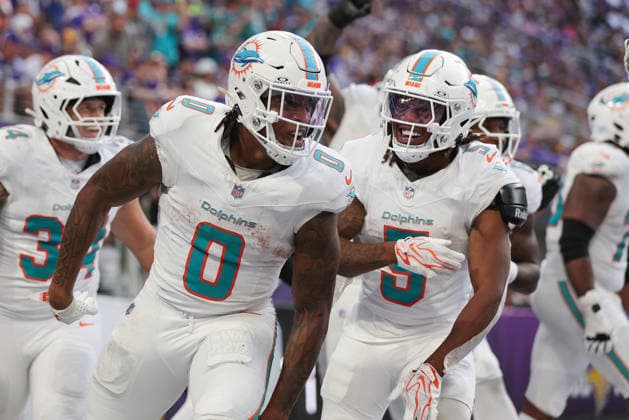MINNEAPOLIS, MN - OCTOBER 04: Miami Dolphins running back Ollie Gordon II (0) celebrates with running back Jaylen Wright (5) after scoring a touchdown during the second half of the NFL, American Football Herren, USA game between the Miami Dolphins and the Minnesota Vikings on October 4th, 2026, at U.S. Bank Stadium in Minneapolis, MN. (Photo by Bailey Hillesheim Icon Sportswire) NFL: OCT 04 Dolphins at Vikings EDITORIAL USE ONLY Icon20261004043