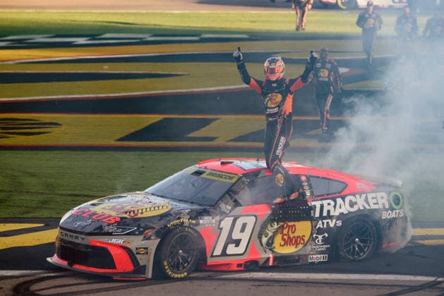 LAS VEGAS, NV - OCTOBER 04: Chase Briscoe ( 19 Joe Gibbs Racing Bass Pro Shops Toyota) climbs on his car to celebrate winning the race during the NASCAR, Motorsport, USA Cup Series Playoffs South Point 400 on October 04, 2026, at Las Vegas Motor Speedway in Las Vegas, NV. (Photo by Chris Williams LVMS Icon Sportswire) AUTO: OCT 04 NASCAR Cup Series Playoffs South Point 400 EDITORIAL USE ONLY Icon0072610041253
