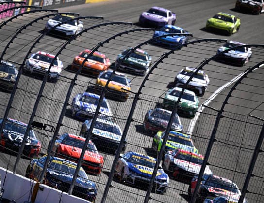 LAS VEGAS, NV - OCTOBER 04: Race cars race into turn 3 during the NASCAR, Motorsport, USA Cup Series Playoffs South Point 400 at Las Vegas Motor Speedway Sunday Oct. 4, 2026 in Las Vegas, Nevada. (Photo by Will Lester Icon Sportswire) AUTO: OCT 04 NASCAR Cup Series Playoffs South Point 400 EDITORIAL USE ONLY Icon26100440552