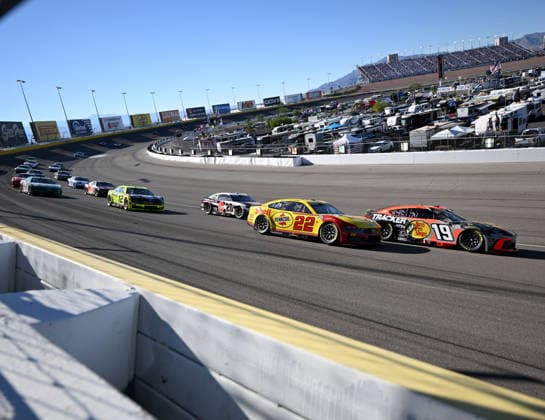 LAS VEGAS, NV - OCTOBER 04: Chase Briscoe ( 19 Joe Gibbs Racing Bass Pro Shops Toyota) leads Joey Logano ( 22 Team Penske Shell Pennzoil Ford) out of turn 2 during the middle laps of the NASCAR, Motorsport, USA Cup Series Playoffs South Point 400 at Las Vegas Motor Speedway Sunday Oct. 4, 2026 in Las Vegas, Nevada. (Photo by Will Lester Icon Sportswire) AUTO: OCT 04 NASCAR Cup Series Playoffs South Point 400 EDITORIAL USE ONLY Icon26100441302