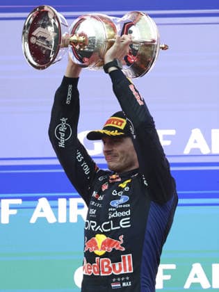 KUALA LUMPUR, MALAYSIA - OCTOBER 04: Max Verstappen of the Netherlands and Oracle Red Bull Racing celebrates on the podium with trophy after winning after the race of the FIA Formula 1 Grand Prix of Bahrain in Malaysia at the Sepang Circuit on October 04, 2026 in Kuala Lumpur, Malaysia. (Photo by Qian Jun SPP-Paddocker) Copyright: xQianxJun SPP-Paddockerx Sportspressphoto_SPR246578