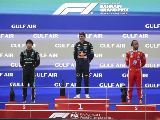 KUALA LUMPUR, MALAYSIA - OCTOBER 04: Andrea Kimi Antonelli of Italy and Mercedes-AMG PETRONAS F1 Team, Max Verstappen of the Netherlands and Oracle Red Bull Racing and Lewis Hamilton of Great Britain and Scuderia Ferrari HP on the podium after the race of the FIA Formula 1 Grand Prix of Bahrain in Malaysia at the Sepang Circuit on October 04, 2026 in Kuala Lumpur, Malaysia. (Photo by Qian Jun SPP-Paddocker) Copyright: xQianxJun SPP-Paddockerx Sportspressphoto_SPR246586