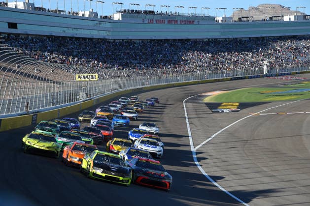LAS VEGAS, NV - OCTOBER 04: Ryan Blaney ( 12 Team Penske Menards Duracell Ford) and Chase Briscoe ( 19 Joe Gibbs Racing Bass Pro Shops Toyota) lead the field into turn 1 for a late race restart during the NASCAR, Motorsport, USA Cup Series Playoffs South Point 400 on October 04, 2026, at Las Vegas Motor Speedway in Las Vegas, NV. (Photo by Chris Williams LVMS Icon Sportswire) AUTO: OCT 04 NASCAR Cup Series Playoffs South Point 400 EDITORIAL USE ONLY Icon0072610041278