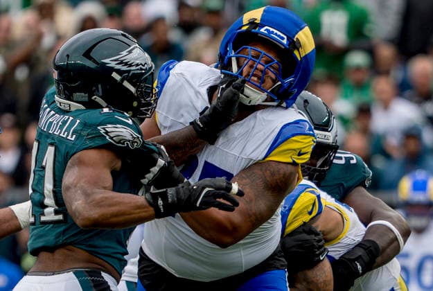 October 4, 2026, Philadelphia, Pa, USA: Oct 4, 2026; Philadelphia, PA, USA; Philadelphia Eagles linebacker Jihaad Campbell (11) and Los Angeles Rams offensive tackle Alaric Jackson (77) battle at the line of scrimmage during the Rams 24-20 win against the Eagles at Lincoln Financial Field. Mandatory Credit: -Cal Media Philadelphia USA - ZUMAcs17 20261004_faf_cs17_193 Copyright: xScottxSeriox