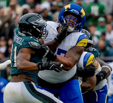 October 4, 2026, Philadelphia, Pa, USA: Oct 4, 2026; Philadelphia, PA, USA; Philadelphia Eagles linebacker Jihaad Campbell (11) and Los Angeles Rams offensive tackle Alaric Jackson (77) battle at the line of scrimmage during the Rams 24-20 win against the Eagles at Lincoln Financial Field. Mandatory Credit: -Cal Media Philadelphia USA - ZUMAcs17 20261004_faf_cs17_194 Copyright: xScottxSeriox
