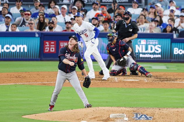 MLB, Baseball Herren, USA National League Division Series - Dodgers vs Braves Game 2 Braves pitcher Grant Holmes (front) watches as Dodgers first baseman Freddie Freeman (back) hits a home run off of him in the fourth inning in Game 2 of the National League Division Series at UNIQLO Field at Dodger Stadium in Los Angeles, California, USA, 04 October 2026. LOS ANGELES CALIFORNIA United States  Copyright: xCHRISxTORRESx