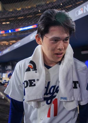 October 4, 2026, Los Angeles, California, USA: Relief pitcher, Roki Sasaki 11 of the Los Angeles Dodgers in the dugout after pitching in 8th and 9th inning during NLDS Game 2 against the Atlanta Braves on Sunday October 4, 2026 at Dodger Stadium in Los Angeles, California. Dodgers lose to Braves, 2-3. JAVIER ROJAS PI Dodgers Vs. Braves NLDS - Game 2  - ZUMAp124 20261004_zaa_p124_038 Copyright: xJavierxRojasx