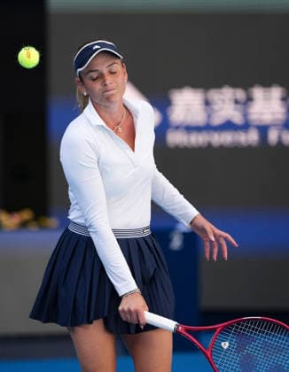 (261005) -- BEIJING, Oct. 5, 2026 -- Donna Vekic of Croatia reacts during the women s singles round of 32 match against Iga Swiatek of Poland at 2026 China Open tennis tournament in Beijing, China, Oct. 5, 2026. ) (SP)CHINA-BEIJING-TENNIS-CHINA OPEN-WOMEN S SINGLES(CN) SunxFei 
