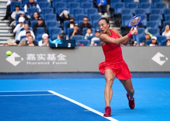 (261005) -- BEIJING, Oct. 5, 2026 -- Zheng Qinwen of China hits a return during the women s singles round of 32 match against Marie Bouzkova of the Czech Republic at 2026 China Open tennis tournament in Beijing, China, Oct. 5, 2026. ) (SP)CHINA-BEIJING-TENNIS-CHINA OPEN-WOMEN S SINGLES(CN) SunxFei 