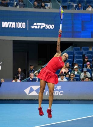(261005) -- BEIJING, Oct. 5, 2026 -- Zheng Qinwen of China hits a return during the women s singles round of 32 match against Marie Bouzkova of the Czech Republic at 2026 China Open tennis tournament in Beijing, China, Oct. 5, 2026. ) (SP)CHINA-BEIJING-TENNIS-CHINA OPEN-WOMEN S SINGLES(CN) SunxFei 