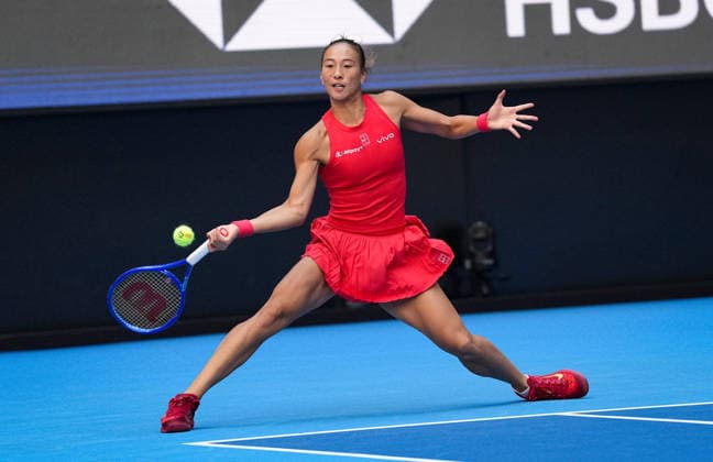 (261005) -- BEIJING, Oct. 5, 2026 -- Zheng Qinwen of China hits a return during the women s singles round of 32 match against Marie Bouzkova of the Czech Republic at 2026 China Open tennis tournament in Beijing, China, Oct. 5, 2026. ) (SP)CHINA-BEIJING-TENNIS-CHINA OPEN-WOMEN S SINGLES(CN) SunxFei 