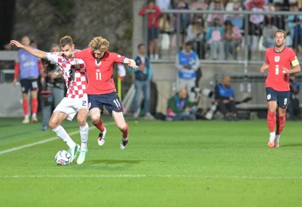 UEFA Nations League League A, Group C, Round 3, 2026–27, soccer match between Croatia and England, Dean Sculac Rujevica Stadium, Rijeka, Croatia, October 3, 2026: Anthony Gordon (England, No. 11) competes for the ball with Josip Stanisic (Croatia, No. 2) during the UEFA Nations League League A, Group C, Round 3, 2026–27, soccer match between Croatia and England at Dean Sculac Rujevica Stadium in Rijeka, Croatia, October 3, 2026 Copyright: xBEAUTIFULxSPORTS Stanusicx