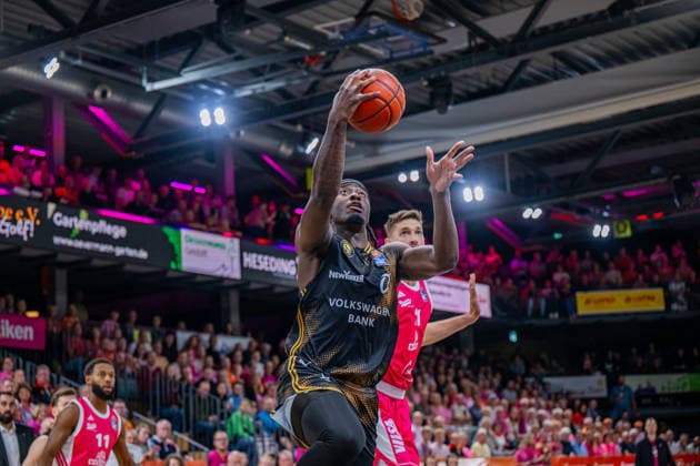 1 Basketball Bundesliga, easyCredit BBL, 2026–2027 Season, Men s Division, Regular Season, Matchday 4, October 5, 2026, RASTA Vechta vs. Basketball Löwen Braunschweig, Zaba Bangala 0; Basketball Löwen Braunschweig on a layup at the RASTA Dome in Vechta, Lower Saxony, Germany