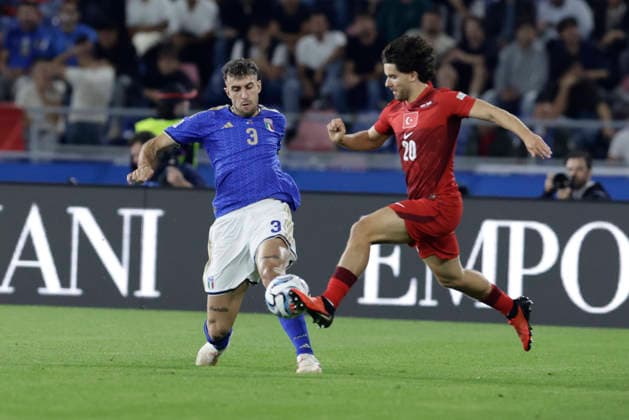 UEFA Nations League football match Italy vs Turkey Matteo Ruggeri of Italy challenges for the ball with Ferdi Kadoglu of Turkiye During UEFA Nations League football match (League A, Group A1) between Italy vs Turkey at the Renato Dall Ara stadium in Bologna on October 05, 2026. _BPH1861 Copyright: xAntonioxBalascox