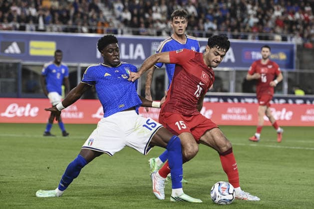 Italy v Turkiye - UEFA Nations League ?????? BOLOGNA, ITALY, OCTOBER 05: Ozan Kabak (R), of Turkiye, is challenged by Issa Doumbia (L), of Italy, during the UEFA Nations League Group A1 League phase football match between Italy and Turkiye at the Renato Dall’Ara stadium in Bologna, Italy, on October 05, 2026. Isabella Bonotto Anadolu Bologna Italy. Editorial use only. Please get in touch for any other usage.  Copyright: x2026xAnadoluxIsabellaxBonottox