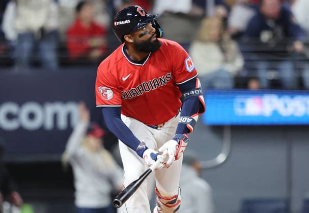 Cleveland Guardians designated hitter Jo Adell (7) hits an rbi-triple in the eighth inning against the Chicago White Sox in an MLB, Baseball Herren, USA American League Division Series playoff game at Progressive Field in Cleveland, Ohio, on Monday, October 5, 2026.  CLE20261005729 AARONxJOSEFCZYK