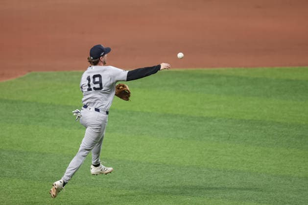 October 5, 2026, St. Petersburg, Florida, USA: New York Yankees third baseman RYAN MCMAHON (19) throws to first base during game 2 of the American League Division Series against the Tampa Bay Rays. The Tampa Bay Rays hosted the New York Yankees the at Tropicana Field in St. Petersburg, FL. St. Petersburg USA - ZUMAm299 20261005_znp_m299_006 Copyright: xTaylorxMcFeex
