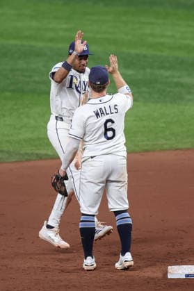 October 5, 2026, St. Petersburg, Florida, USA: Tampa Bay Rays shortstop TAYLOR WALLS (6) and left fielder CHANDLER SIMPSON (14) celebrate after a win against the New York Yankees in game 2 of the American League Division Series. The Tampa Bay Rays hosted the New York Yankees the at Tropicana Field in St. Petersburg, FL. St. Petersburg USA - ZUMAm299 20261005_znp_m299_016 Copyright: xTaylorxMcFeex