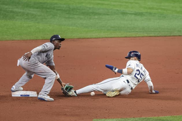 October 5, 2026, St. Petersburg, Florida, USA: Tampa Bay Rays right fielder VICTOR MESA JR. (25) slides into second base during game 2 of the American League Division Series against the New York Yankees. The Tampa Bay Rays hosted the New York Yankees the at Tropicana Field in St. Petersburg, FL. MLB, Baseball Herren, USA 2026: Tampa Bay Rays 5:2 New York Yankees  - ZUMAm299 20261005_znp_m299_039 Copyright: xTaylorxMcFeex