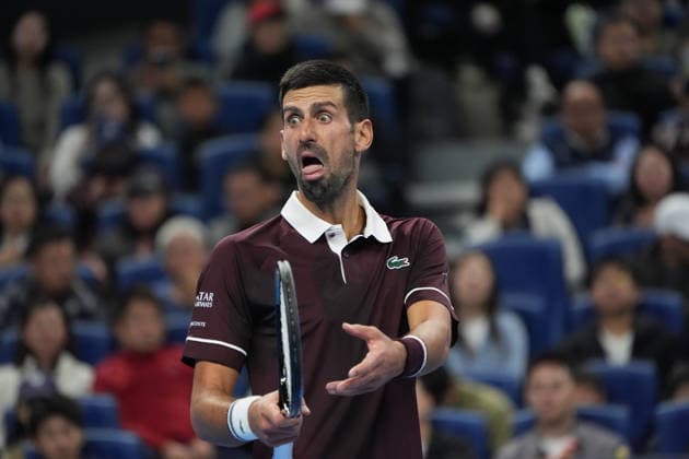 (261006) -- BEIJING, Oct. 6, 2026 -- Novak Djokovic reacts during the men s singles semifinal match between Daniil Medvedev of Russia and Novak Djokovic of Serbia at 2026 China Open tennis tournament in Beijing, China, Oct. 5, 2026. ) (SP)CHINA-BEIJING-TENNIS-CHINA OPEN-MEN S SINGLES(CN) XiexHan 