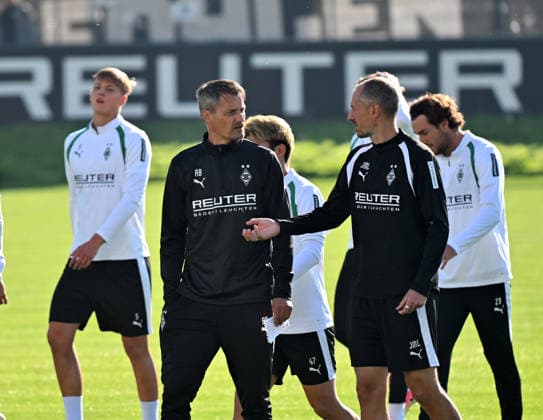 October 6, 2026, Mönchengladbach Soccer, Men s, 2026–2027 season, Borussia Mönchengladbach training session: In conversation, from left, Alexander Blessin, Gladbach head coach, and Jan Moritz Lichte, Gladbach assistant coach. DFL regulations prohibit any use of photographs as image sequences and or quasi-video content at Borussia Park, North Rhine-Westphalia, Germany