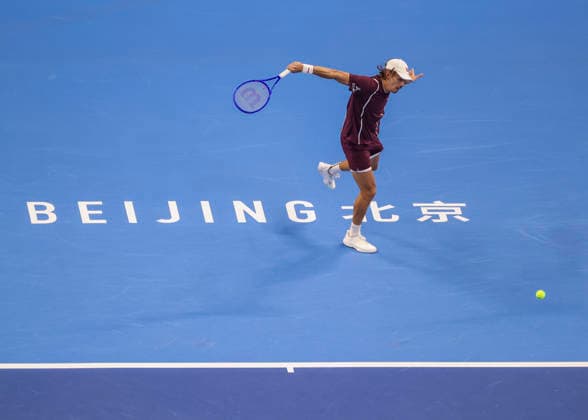 (261006) -- BEIJING, Oct. 6, 2026 -- Alex de Minaur of Australia hits a return during the men s singles final match against Novak Djokovic of Serbia at 2026 China Open tennis tournament in Beijing, China, Oct. 6, 2026. (Photo by Xinhua) (SP)CHINA-BEIJING-TENNIS-CHINA OPEN-MEN S SINGLES-FINAL(CN) MaxZihan
