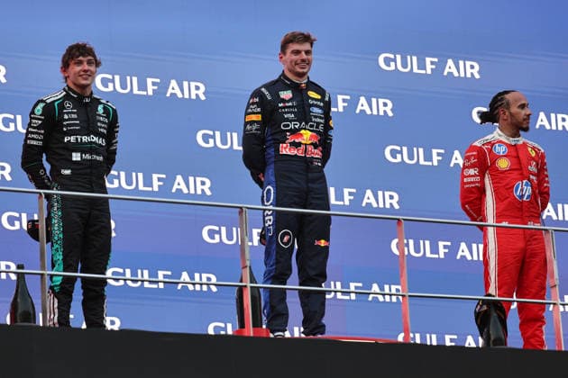 SEPANG, SGR - OCTOBER 04: Kimi Antonelli of Italy and Mercedes-AMG PETRONAS F1 Team, Max Verstappen of Netherlands and Oracle Red Bull Racing, and Lewis Hamilton of Great Britain and Scuderia Ferrari HP on the podium following the conclusion of the Formula 1 Gulf Air Bahrain Grand Prix on October 04, 2026 held at Sepang International Circuit in Sepang, Malaysia. (Photo by Hazrin Yeob Men Shah Icon Sportswire) AUTO: OCT 04 F1 Bahrain Grand Prix in Malaysia EDITORIAL USE ONLY Icon37826100411550