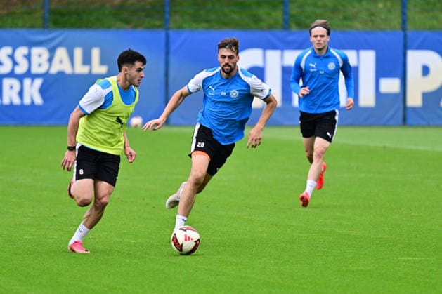 October 6, 2026, Soccer, Men s, 2nd Bundesliga, 2026–2027 Season, Holstein Kiel Training, KSV Guillermo Balzi vs. Jonas Meffert; Jonas Therkelsen can no longer intervene; Kiel, near Holstein Stadium Projensdorf, Training Center, Northern Schleswig-Holstein, Germany