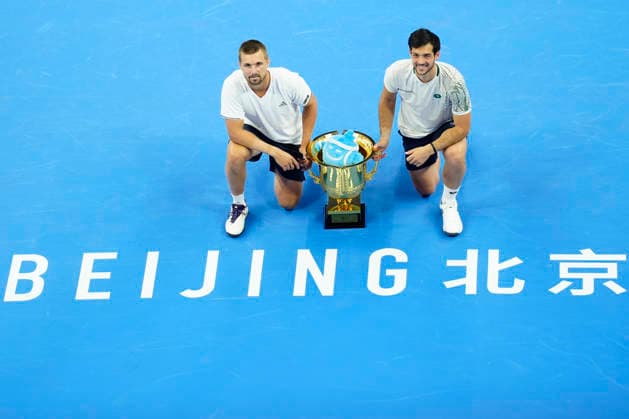 October 6, 2026, Beijing, China: Julian Cash and Lloyd Glasspool of Great Britain pose with their winner s trophy during the medal ceremony after winning against Sander Arends and David Pel of Netherlands (not in view) during the Men s Doubles final match on day seven of China Open at the National Tennis Center. Julian Cash and Lloyd Glasspool won, Final Score: 6-3, 3-6, 10-6 2026 China Open In Beijing - 06 Oct 2026  - ZUMAs197 20261006_aaa_s197_256 Copyright: xPolyxFeix