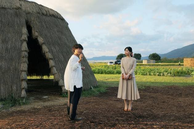 Princess Kako in Kyoto Pref. Japanese Princess Kako (R) looks at a straw hut built by a man (L) as an artwork in a park in Kameoka in Kyoto Prefecture, western Japan, on Oct. 6, 2026. (Pool photo)  A14AA0005630347P