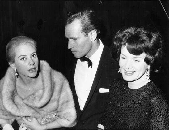 Dec 09, 1961; Paris, France; Actor CHARLTON HESTON known for his religious roles in Ben-Hur and The Ten Commandments , pictured with his wife LYDIA CLARKE and GENEVIEVE PAGE at the premiere of El Cid . Paris France  - ZUMAk09